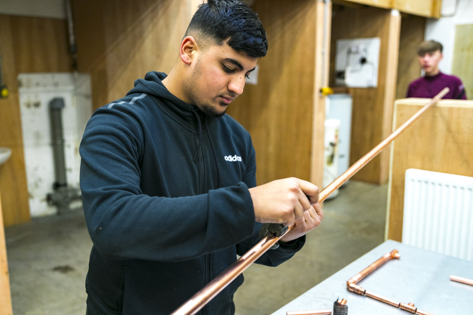 a student working in the construction workshop