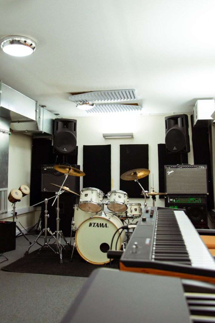music facilities showing sound systems, a drumkit and a keyboard
