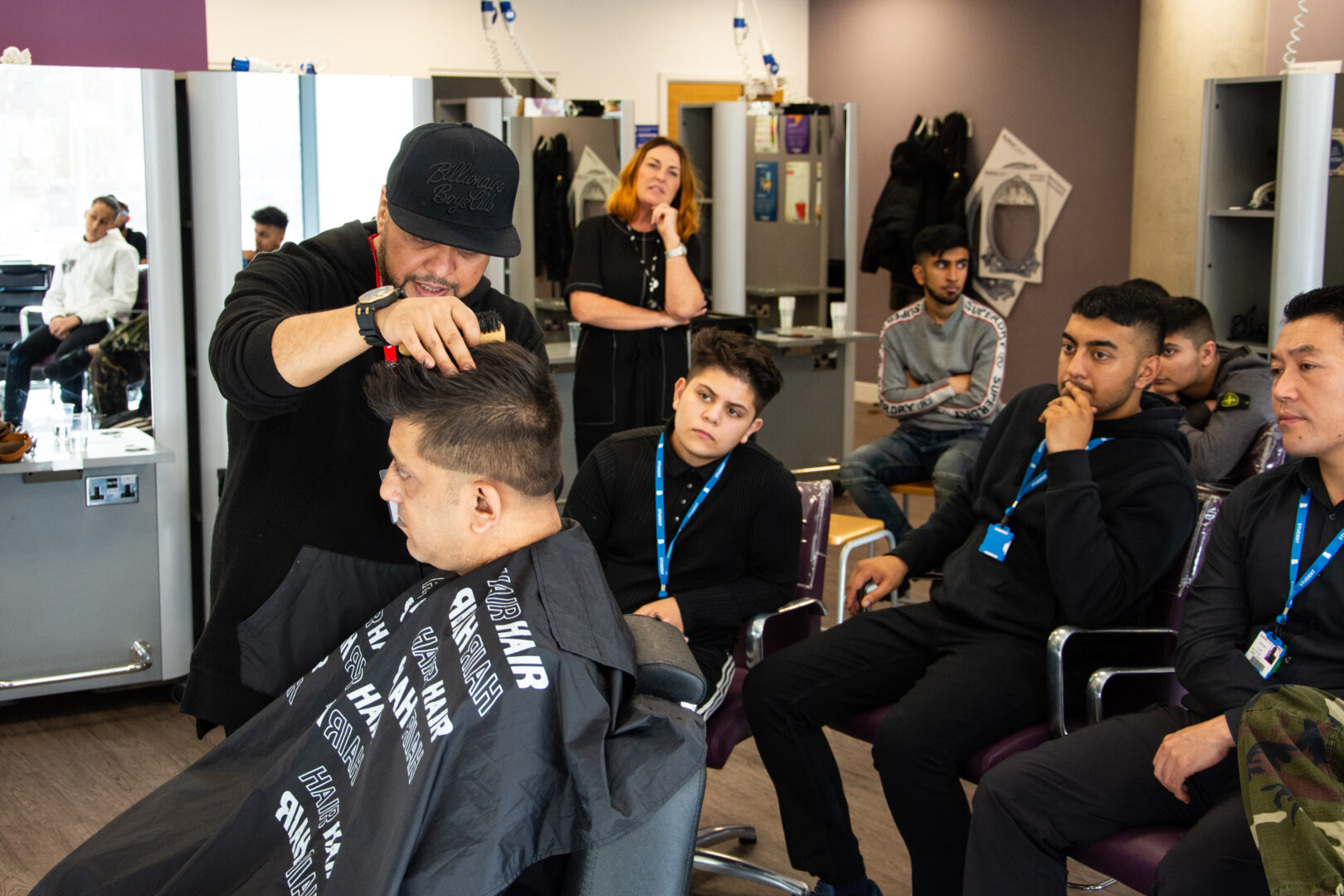 barbering students watching a barbering masterclass