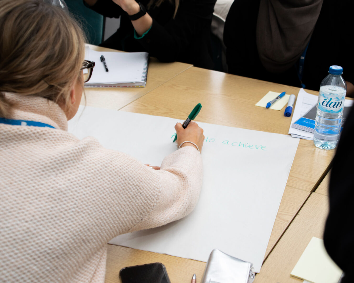 student sat working in a classroom