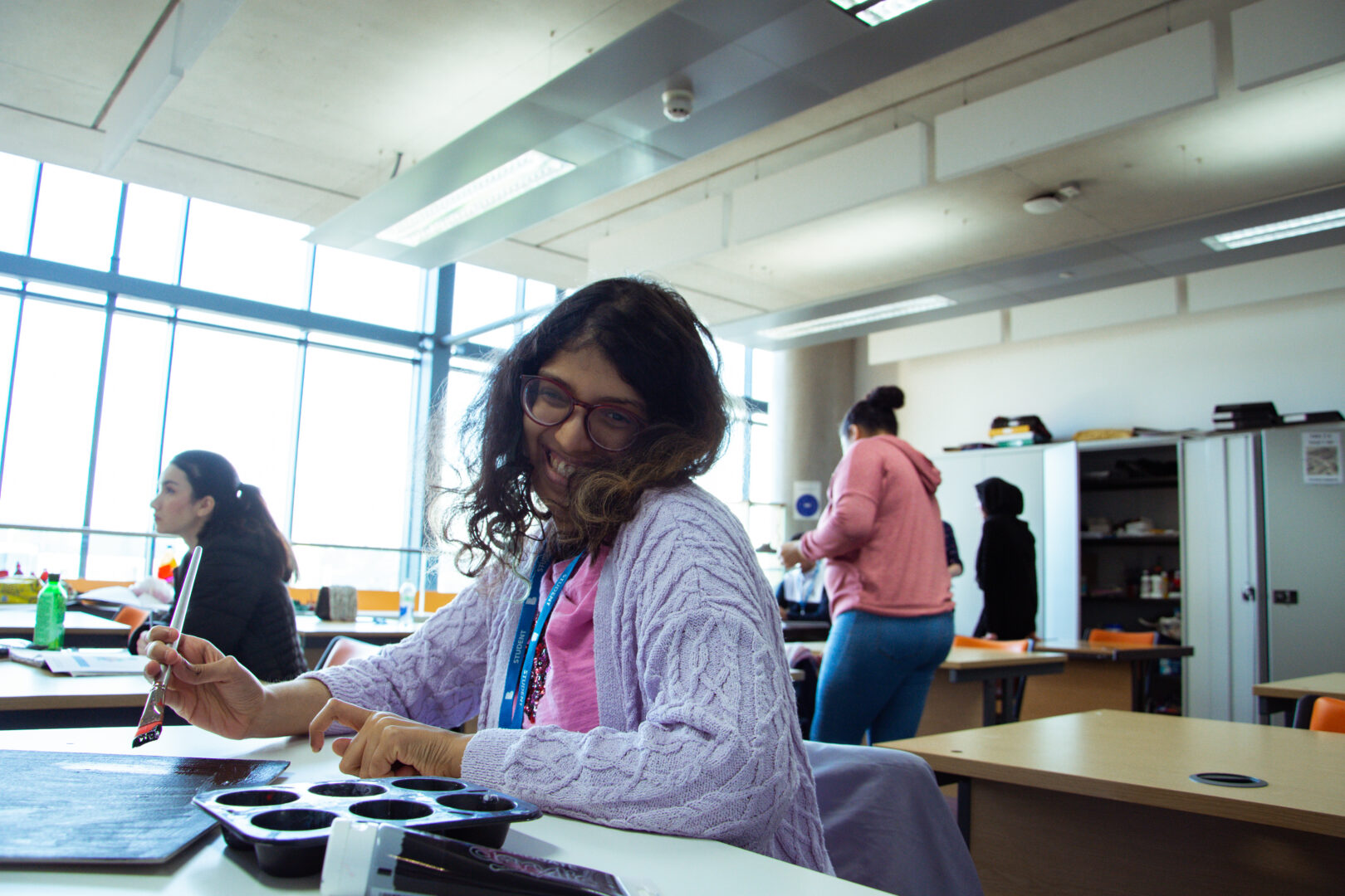 entry level art student working in a classroom