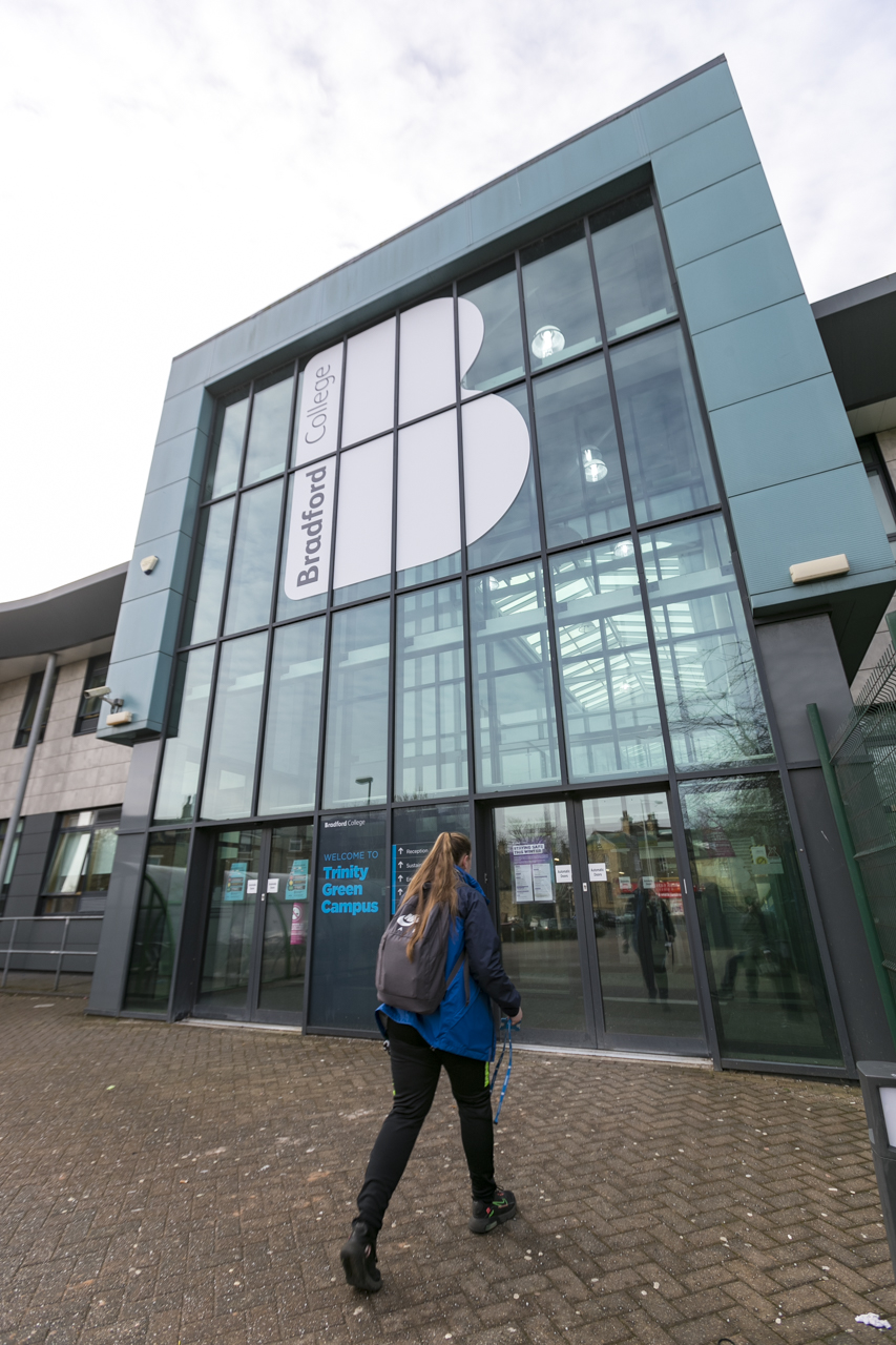 an outdoor photograph of the enterance to the trinity green building