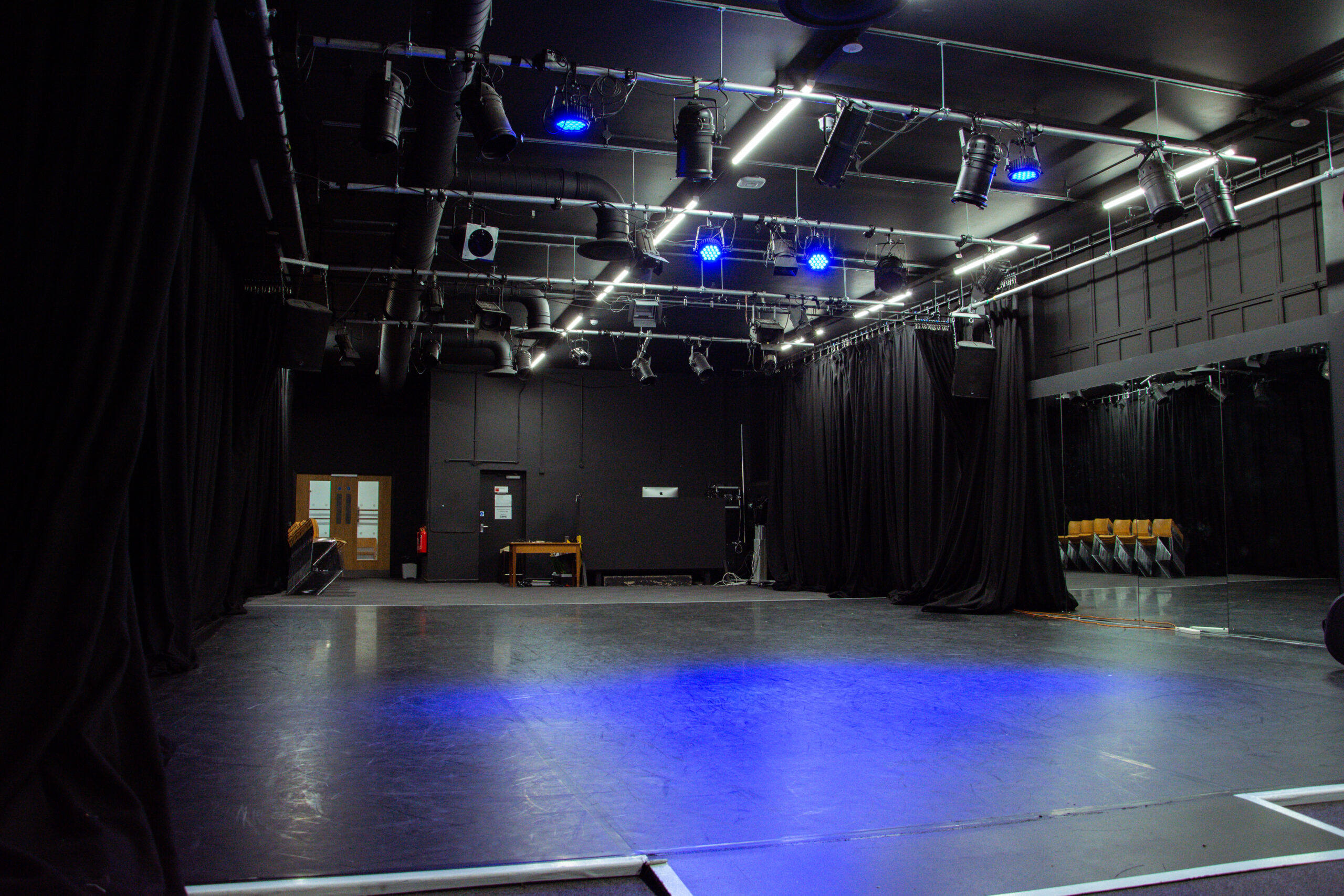 an empty shot of our performance space in the lister building
