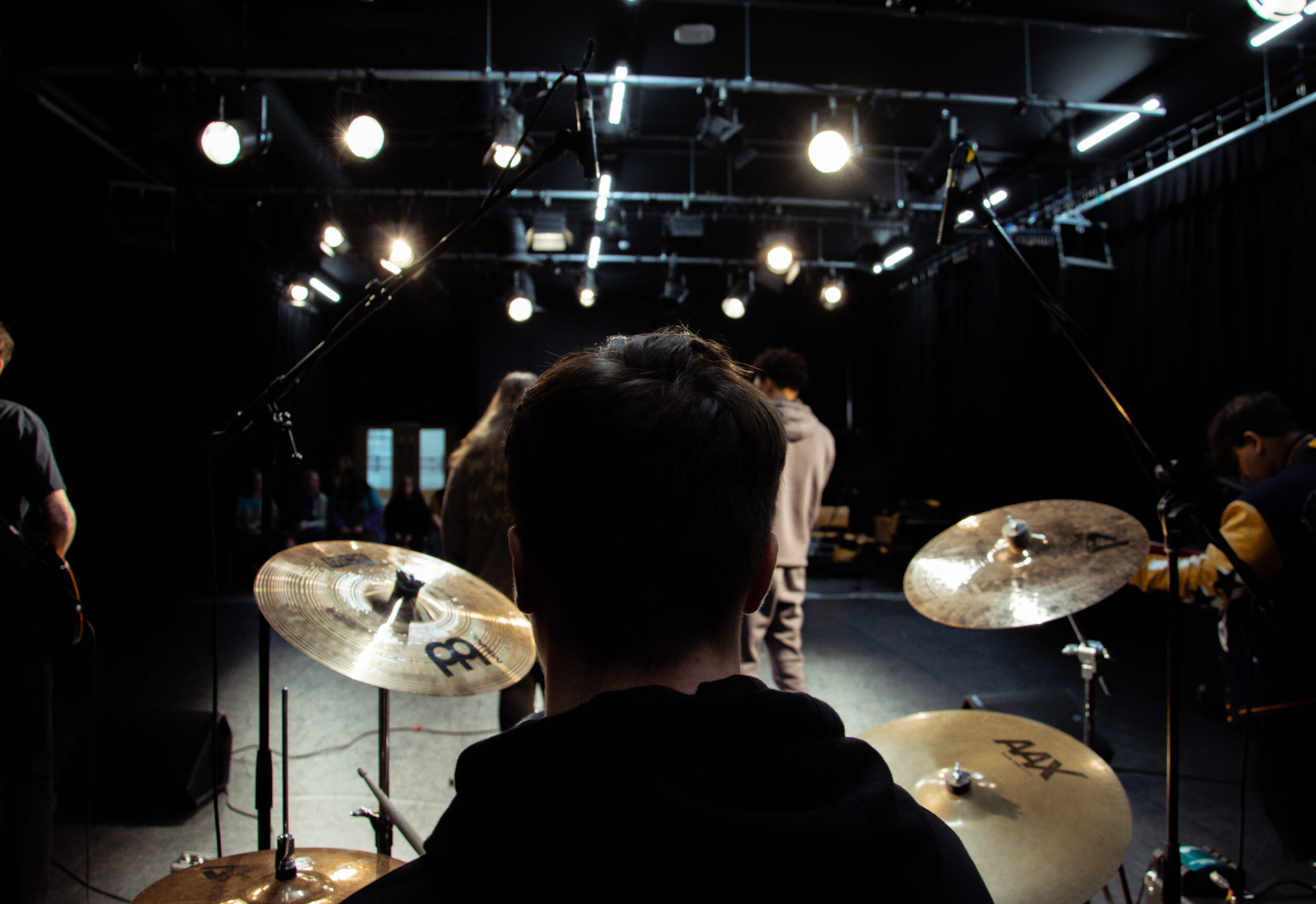 photograph from the perspective of a music student sat at a drumkit