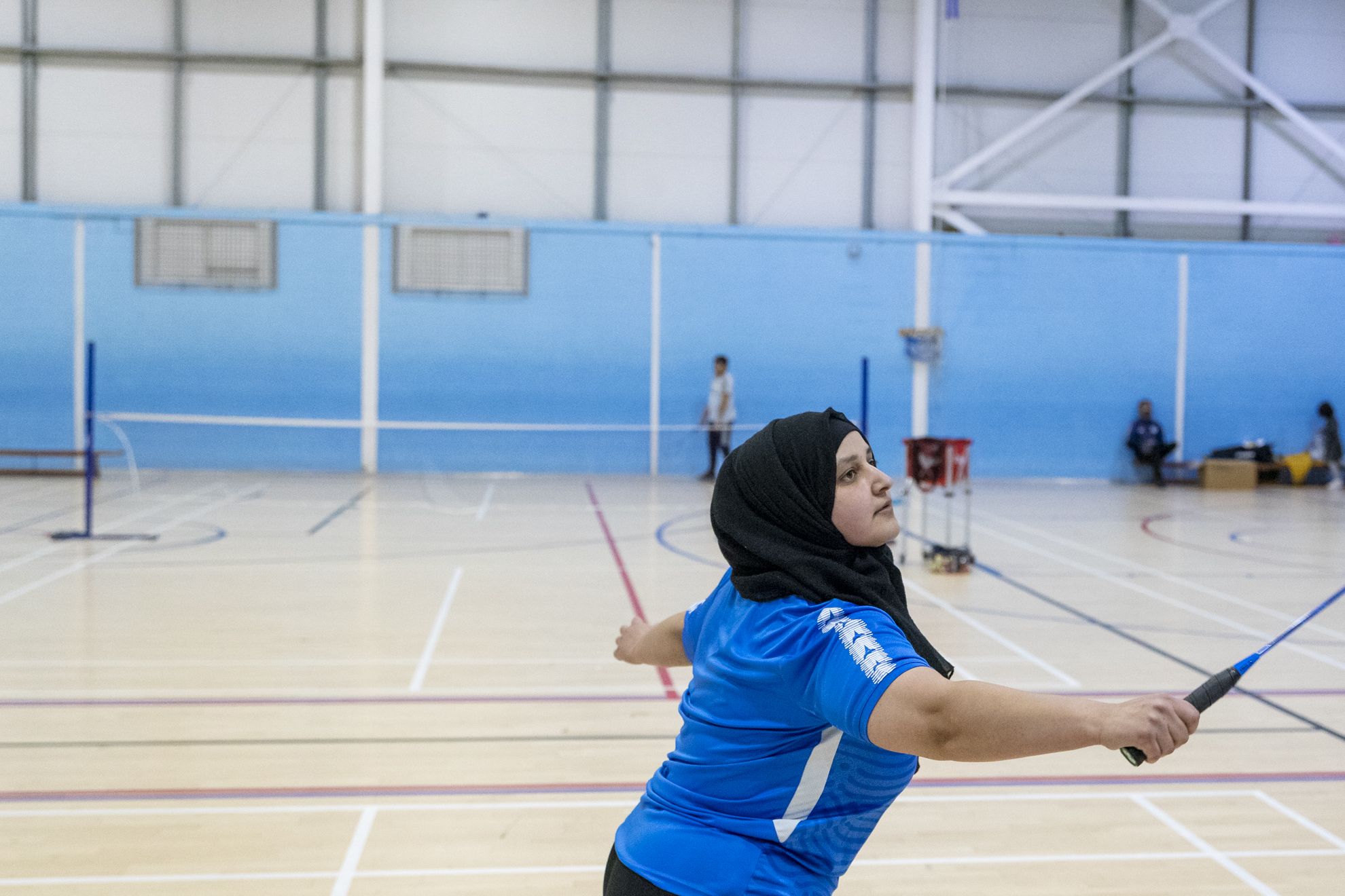 a sports student in a game of badminton