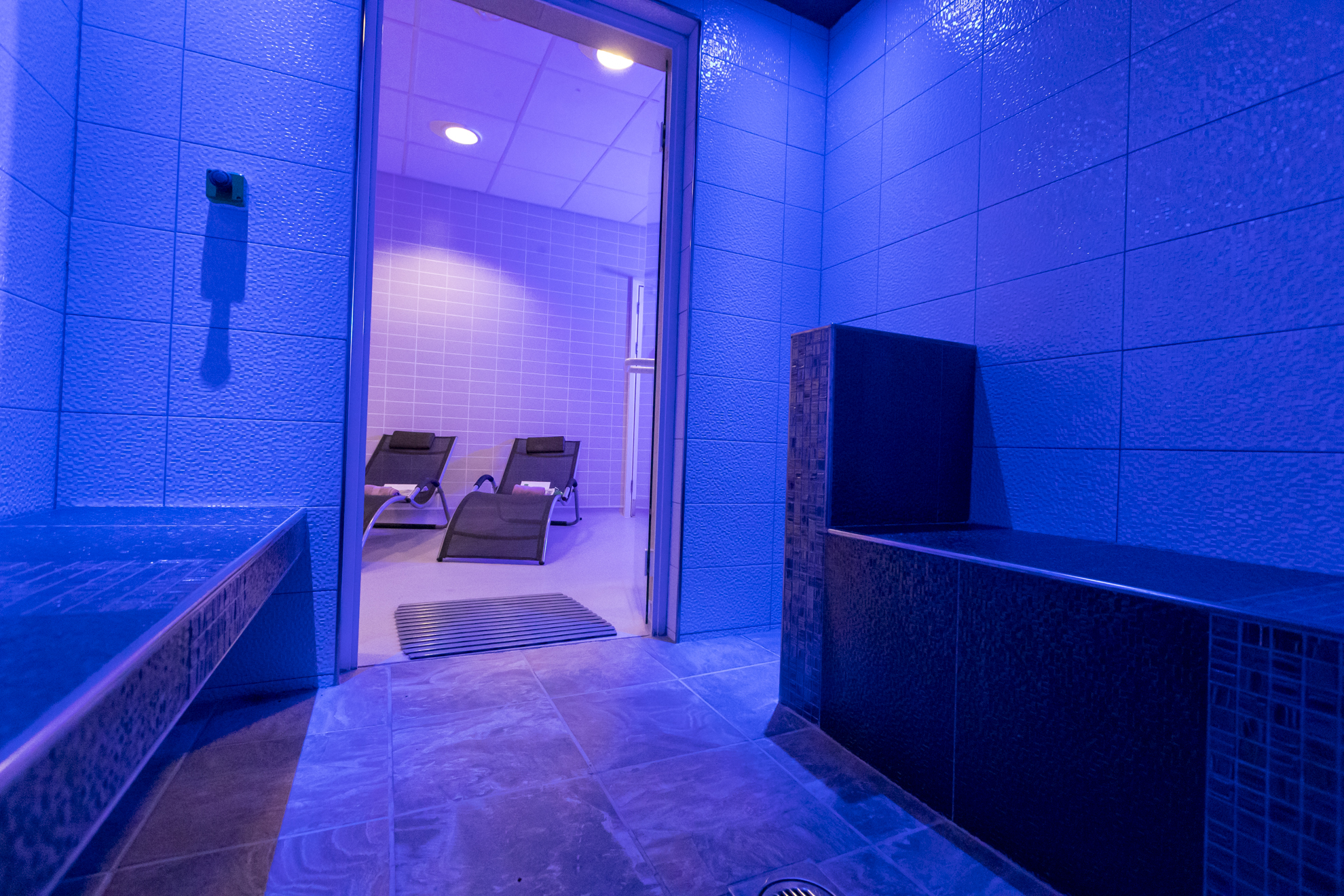 an indoor image of our steam room and sauna at the signature spa