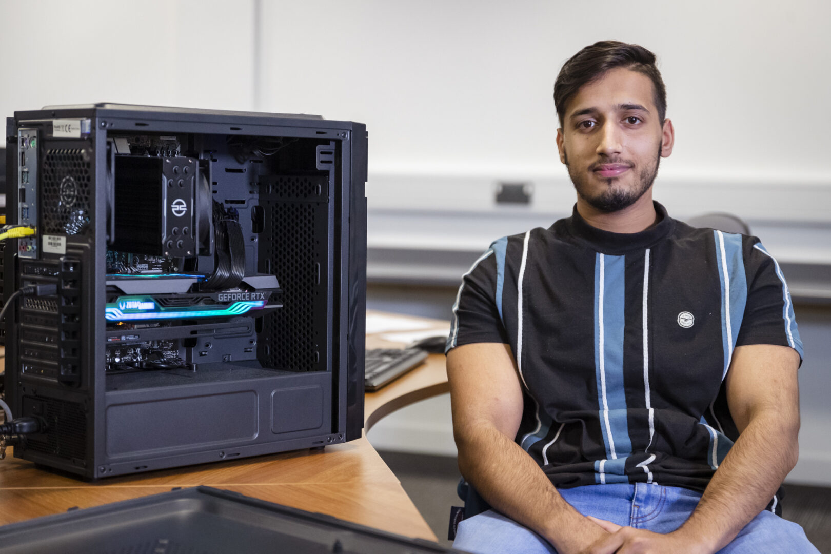 computing student sat at a desk