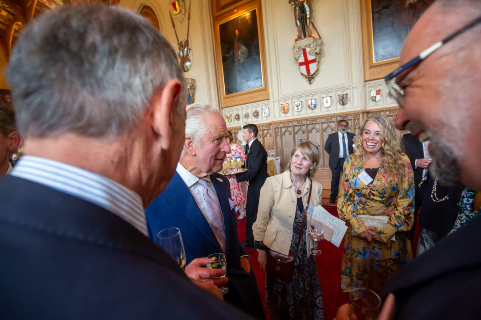 our esol lecturer, esther wilkey, pictured speaking with hrh king charles at buckingham palace