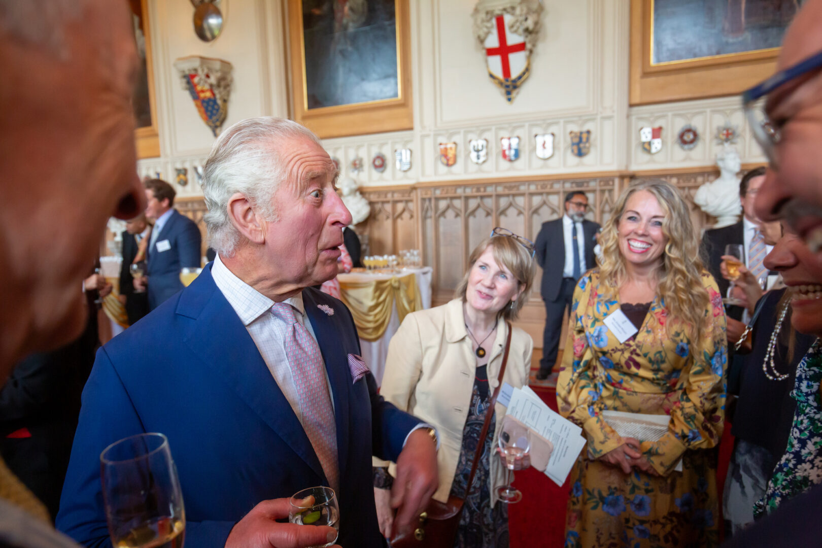 our esol lecturer, esther wilkey, pictured with hrh king charles at buckingham palace