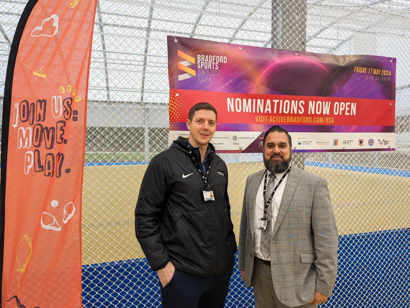 two members of bradford college sponsoring a category at the bradford sports awards 2024