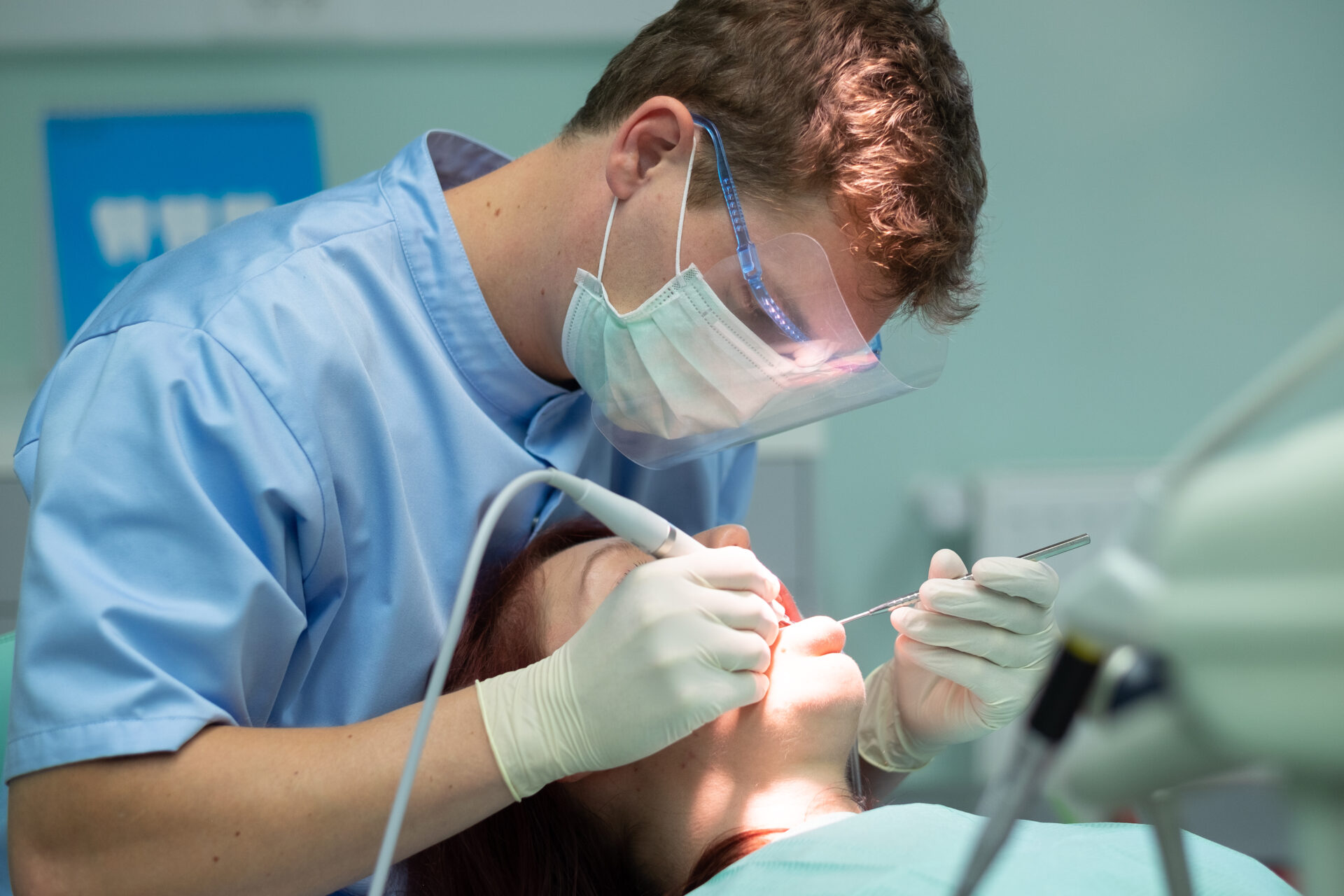 Someone receiving hygienist treatment