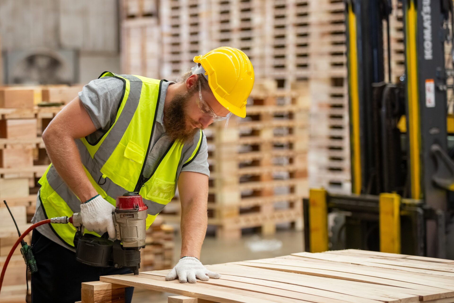 A joiner using a nail gun