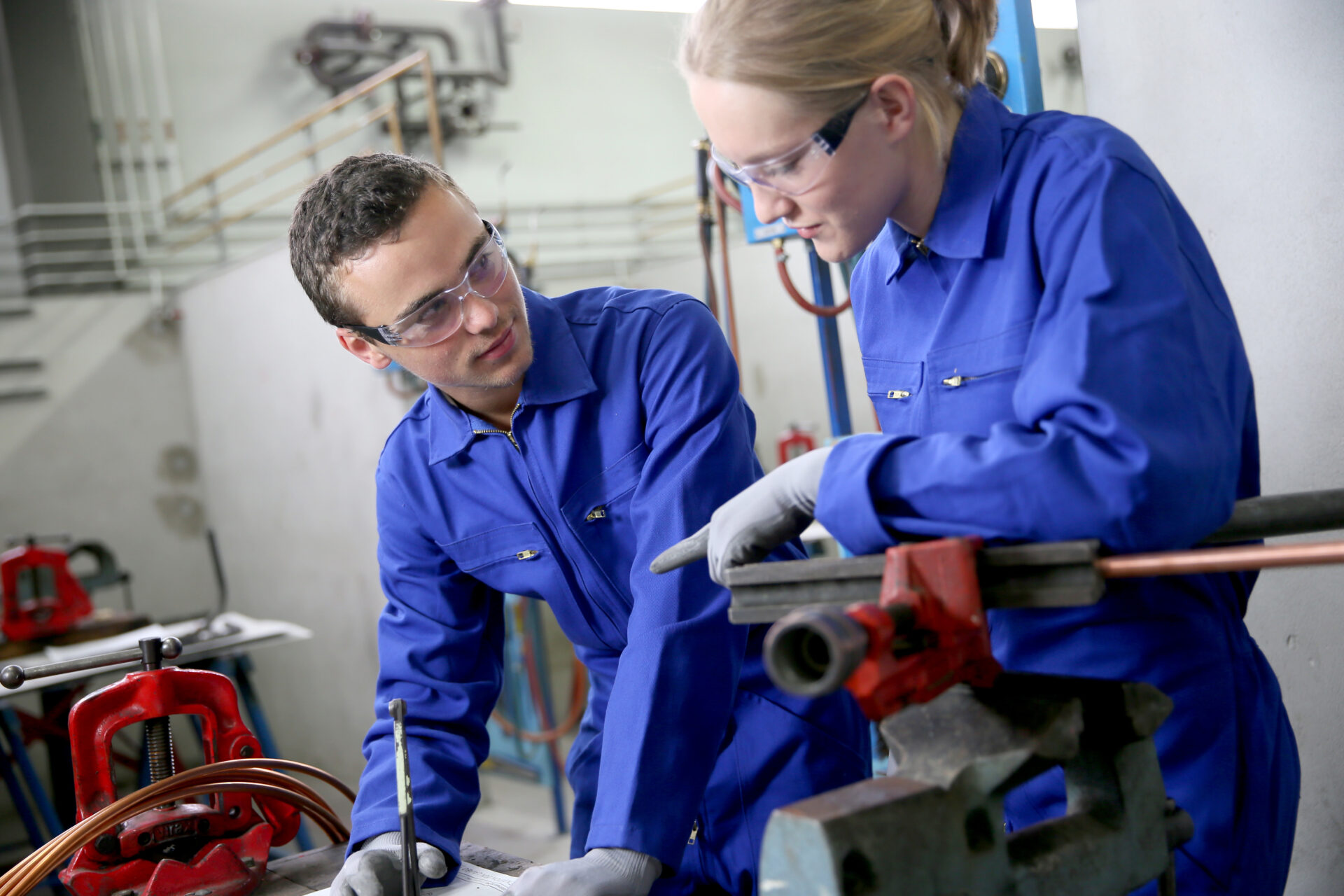 2 Students in a plumbing workshop