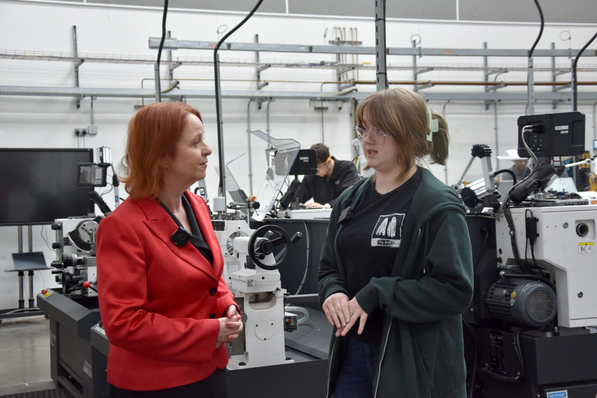 Judith Cummins MP chats with a student during her visit to Bradford College