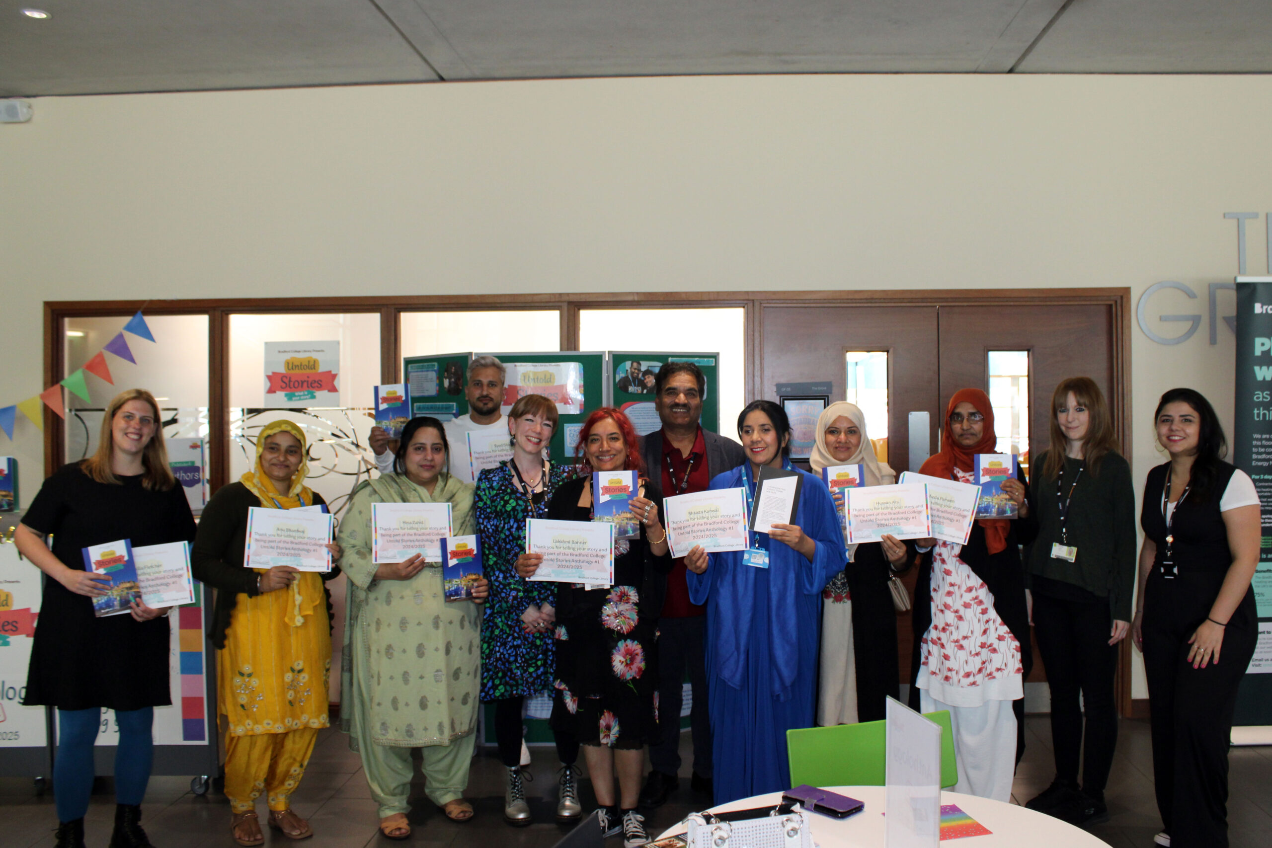 Untold Stories: an image of Authors receiving their certifcates