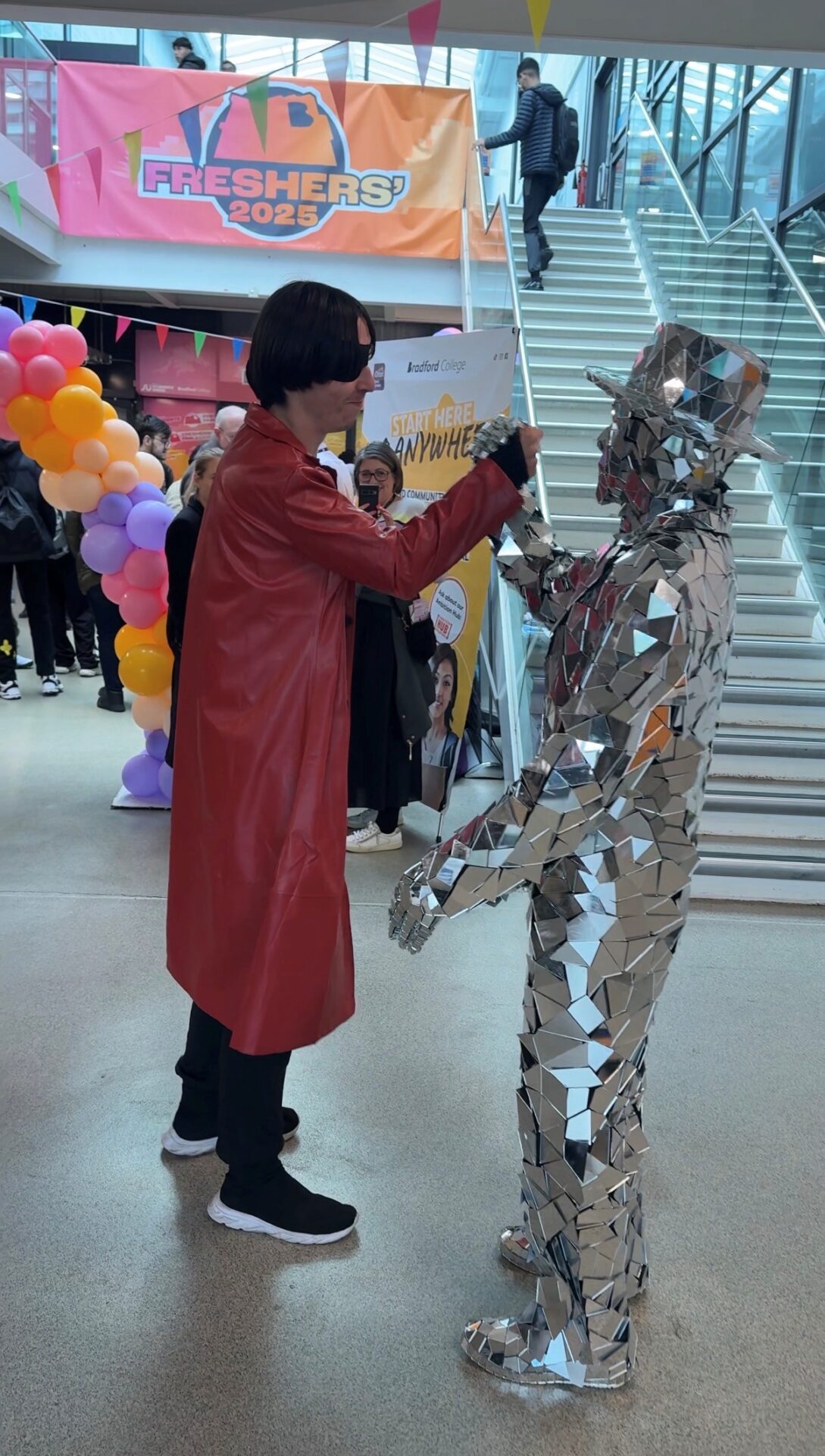 An image of the mirrored man at Freshers' Fair 2025
