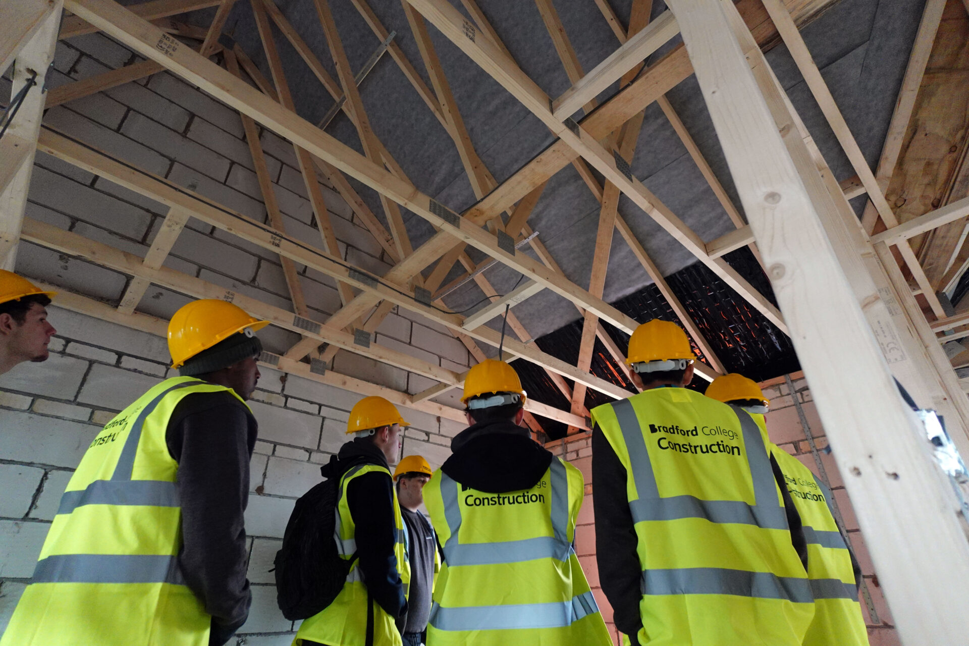 An image of joinery and brickwork students at Persimmon Homes