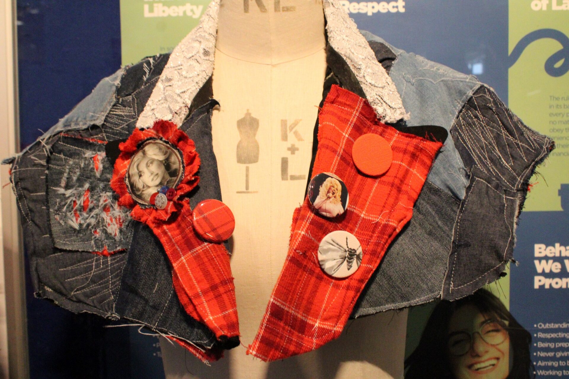 A close up of a colourful denim cape made by a Bradford College fashion student.